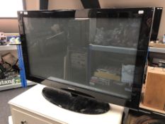 A Samsung 54'' plasma TV, no lead, no remote.