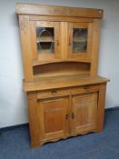 An early twentieth century continental oak double door sideboard (doors a/f)