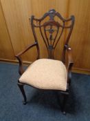 An Edwardian mahogany armchair