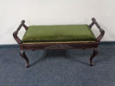 A late 19th century mahogany storage duet piano stool