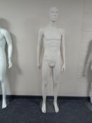 A male mannequin on stand (flesh matte).