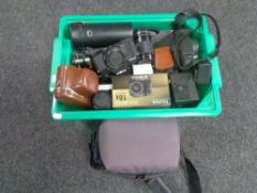 A box of assorted cameras to include Pentax, Canon,