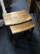 A nest of two oak tables