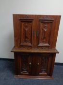 Two early twentieth century double door wall cabinets