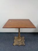 A pub table on cast iron pedestal, 60 x 70 cm.