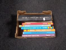 A box of Haynes car manuals,