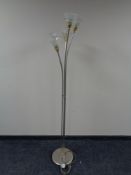 A contemporary five branch floor lamp