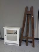 A contemporary mirrored bathroom cabinet together with a twentieth century pine folding easel