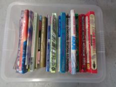 A box of hardback books to include Guinness book of records, reference,