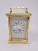 A French brass cased eight day carriage clock