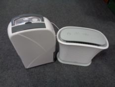 A Dehumidifier together with a Homedics air cooler.