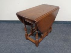 An old charm drop leaf coffee table