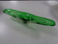 A 1970's green glass bowl,