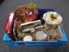 A box of brass oil lamp with cranberry glass reservoir (converted),