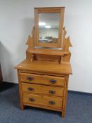 An Edwardian satin walnut dressing chest