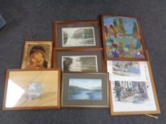 A box of assorted pictures to include a 20th century oak framed tapestry of a cottage,