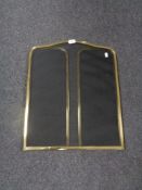 A brass three way folding spark guard.