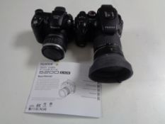 A tray containing Fujifilm EXR camera with lens and a further Fujifilm finepix S5600 with lens