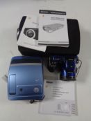 A tray of Nikon Coolpix camera, Polaroid camera,