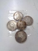 Four Victorian silver Crowns together with an 1890 Victorian silver florin.