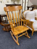 A pine rocking chair