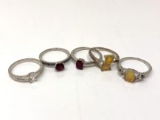 Five silver gem set dress rings.