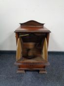 An Edwardian mahogany coal receiver.