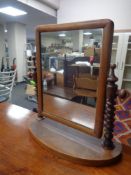 A Victorian mahogany barley twist toilet mirror
