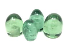 Four nineteenth century green glass dumps (4)