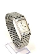 A gent's wristwatch, put together with the case of a Jaeger LeCoultre 'Reverso' or similar watch,