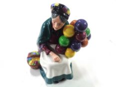 A Royal Doulton figure, The Old Balloon Seller, HN1315.