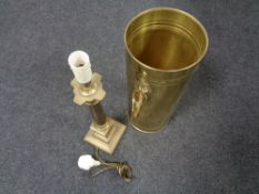 A brass lion mask handle stick stand together with a brass Corinthian column table lamp