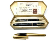 A boxed pen and pencil set with original receipt from 1956 and a 14ct gold filled Parker with 14ct