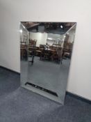 An all glass framed mirror