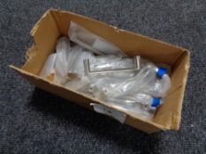 A box containing 16 stainless steel kitchen cabinet door handles (new).