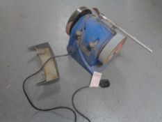 A Clarke whetstone sharpener.