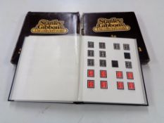 Two albums of stamps - GB Definitives used and mint.