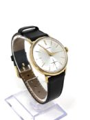 A gent's 9ct gold Garrard manual wind wristwatch