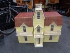 A double fronted doll's house.