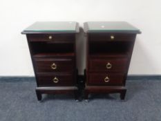 A pair of Stag Minstrel two drawer bedside stands with slides