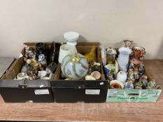 Three boxes containing miscellaneous to include pottery vases, continental figures,