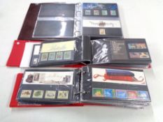 Three albums of GB presentation packs 1977 - 1990.