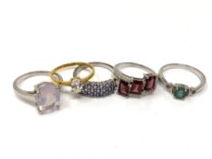 Five silver gem set dress rings.