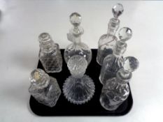 A tray containing seven 20th century glass decanters.