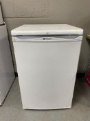 A HotPoint under bench fridge.