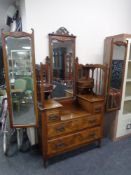 An Edwardian walnut sunk centre dressing chest with triple mirror