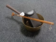 An antique brass saucepan together with a wooden back scratcher and a pair of Praktica 12 x 25