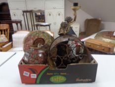 A box containing papier-mache table lamp, metal wine rack, figural table lamp etc.
