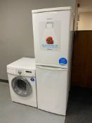 A Candy upright fridge freezer.