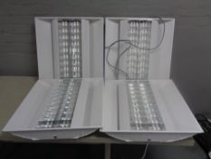 Three metal strip light fittings.